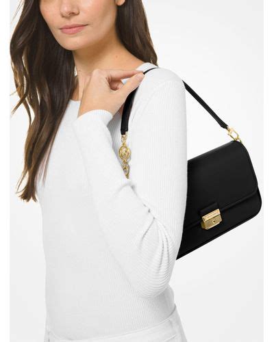 michael kors bradshaw small leather shoulder bag|Michael Kors black messenger bag.